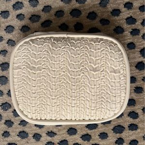 Small, white Lalicious cosmetics bag. Never used. Great for makeup, jewelry, etc